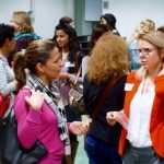 Group of diverse women networking at Heidelberg International Professional Women's Forum (HIP) event.
